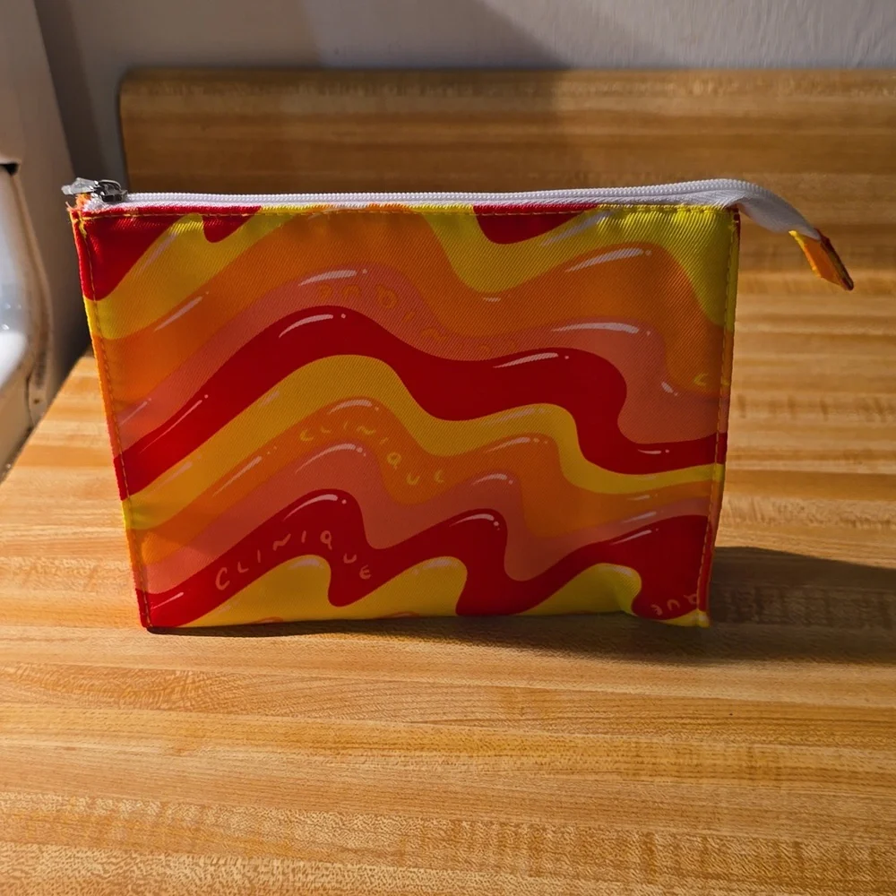 Clinique Cosmetic Makeup Pouch NWOT Red Orange Yellow Wave Pattern‎